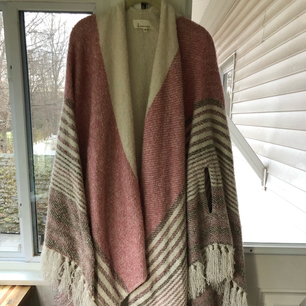 Beautiful anthropology, pink and cream shawl with arm holes. One size.
